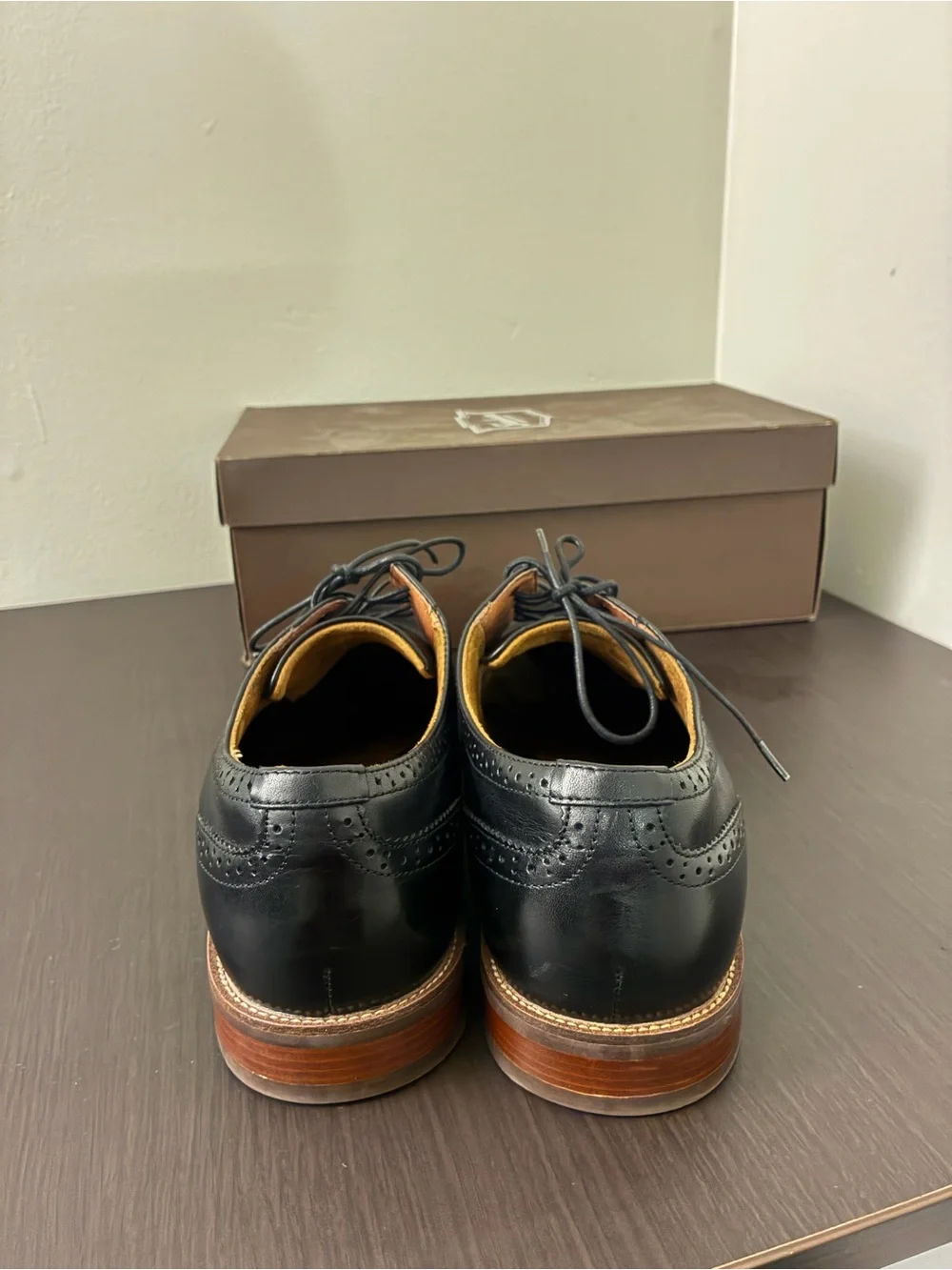 Florsheim Black Leather Wingtip Oxfords with Brown Sole Trim